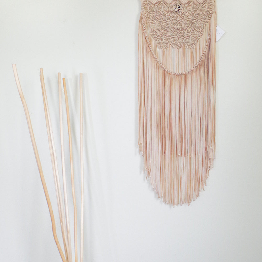 
                      
                        Gotita Wall Hanging
                      
                    